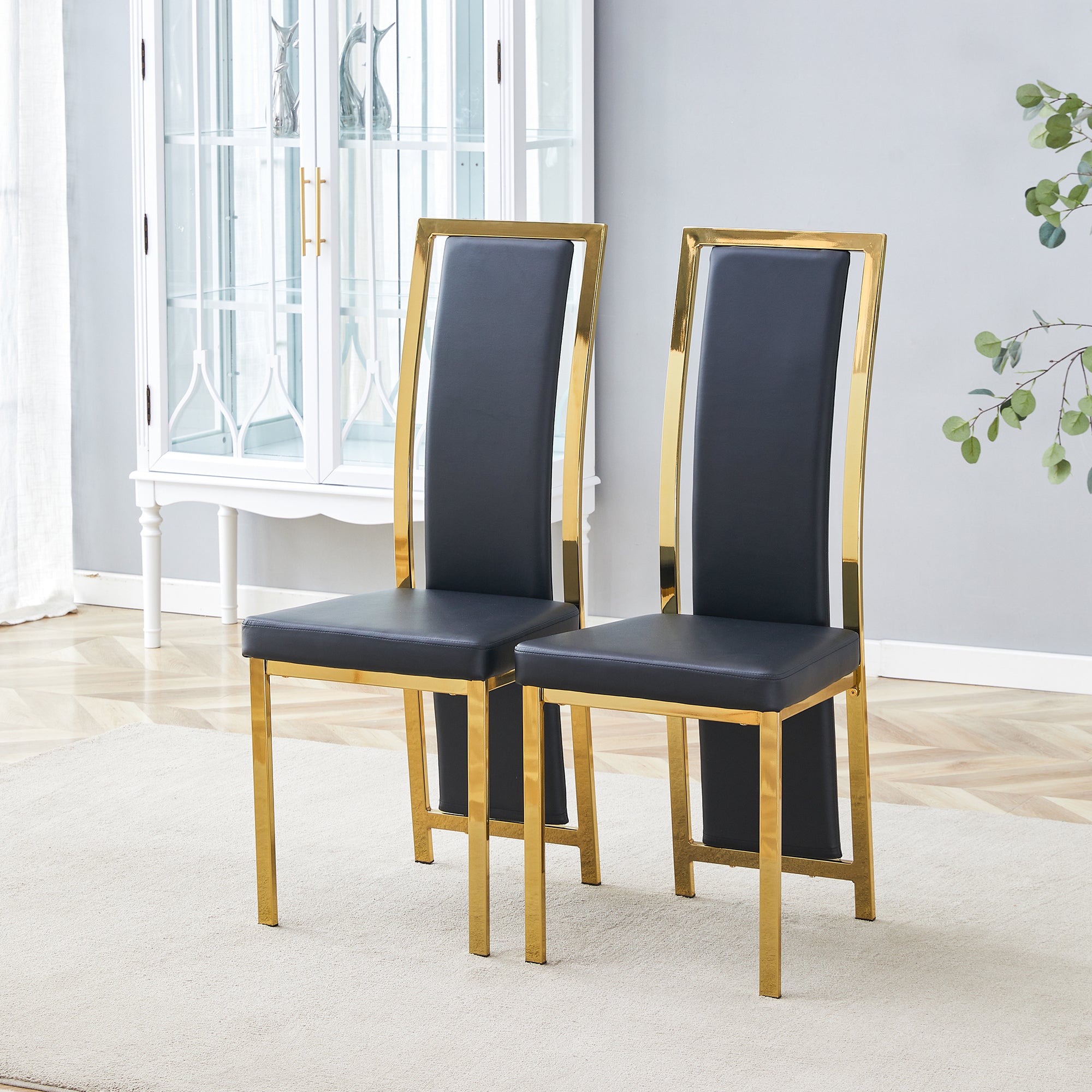 Sæt Med Styks Minimalistiske Spisebordsstole Med Gulddetaljer Sort Pu-læder Guldfarvet Metalstel 109 Cm Høje